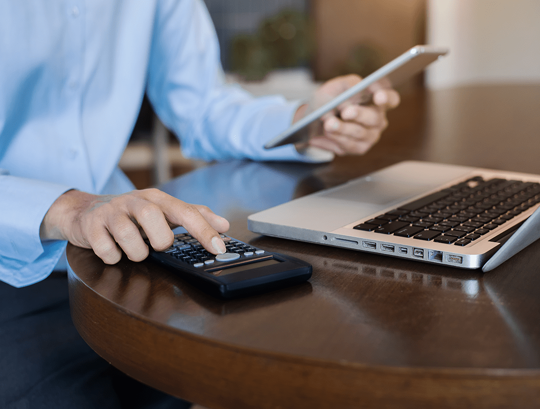 a man using a calculator